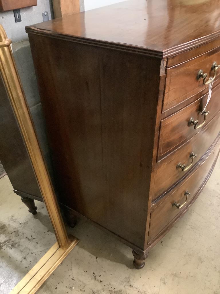 A Regency inlaid mahogany chest fitted four graduated long drawers, width 107cm depth 52cm height 97cm